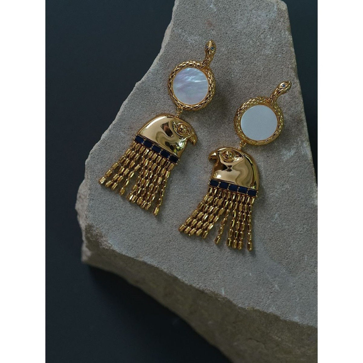 Falcon-head earrings